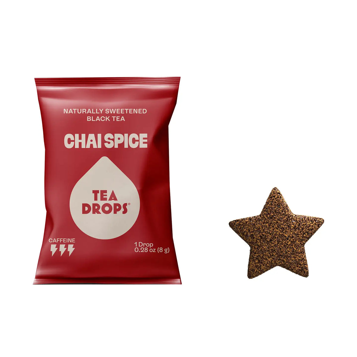 A red bag of Tea Drops Chai Spice black tea drops next to a single star-shaped tea drop on a plain white background.