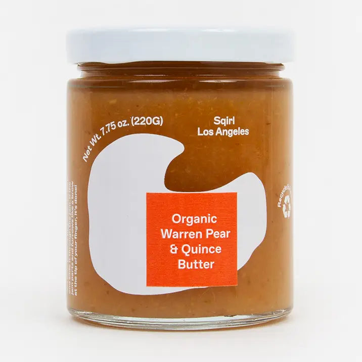 Jar of Organic Warren Pear & Quince Butter with a white lid on a white background