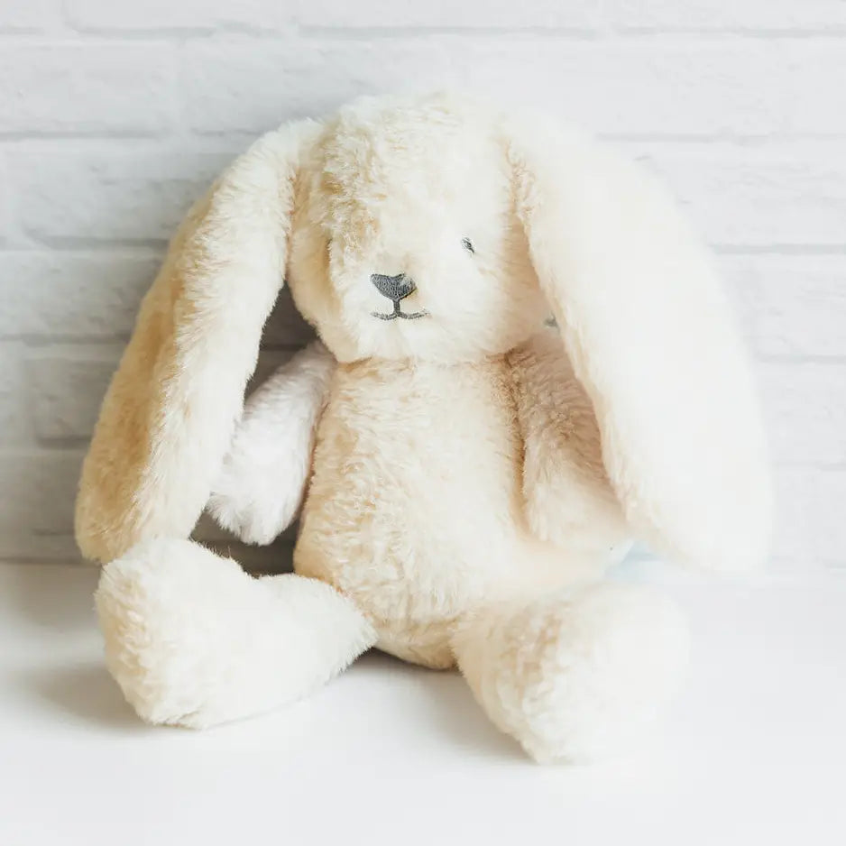 Plush bunny toy on a light background
