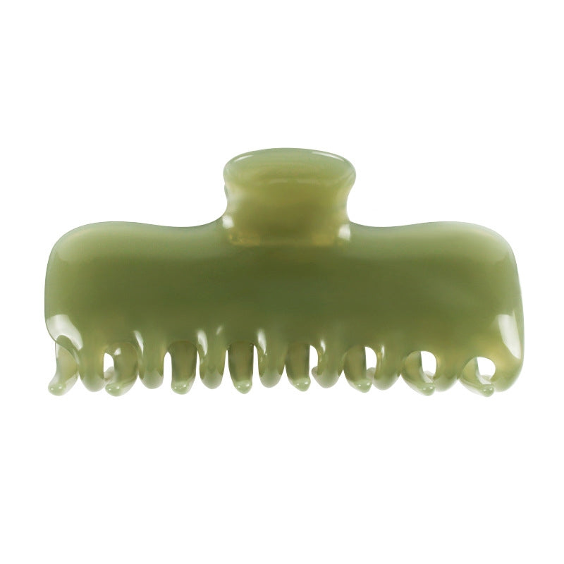 A single olive green hair claw clip shown against a plain white background.
