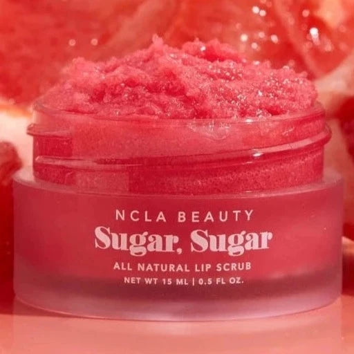 lip scrub surrounded by grapefruit 