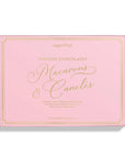 A pink rectangular box of sugarfina Parisian Chocolates Macarons & Caneles, featuring elegant gold foil lettering and border details, set against a clean white background with a soft drop shadow.