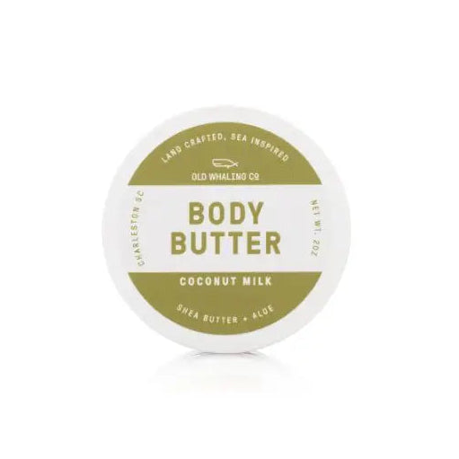 Jar of body butter with coconut milk flavor on a white background
