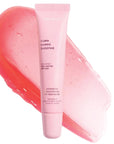 pink lip balm tube with pink gloss swatch behind it