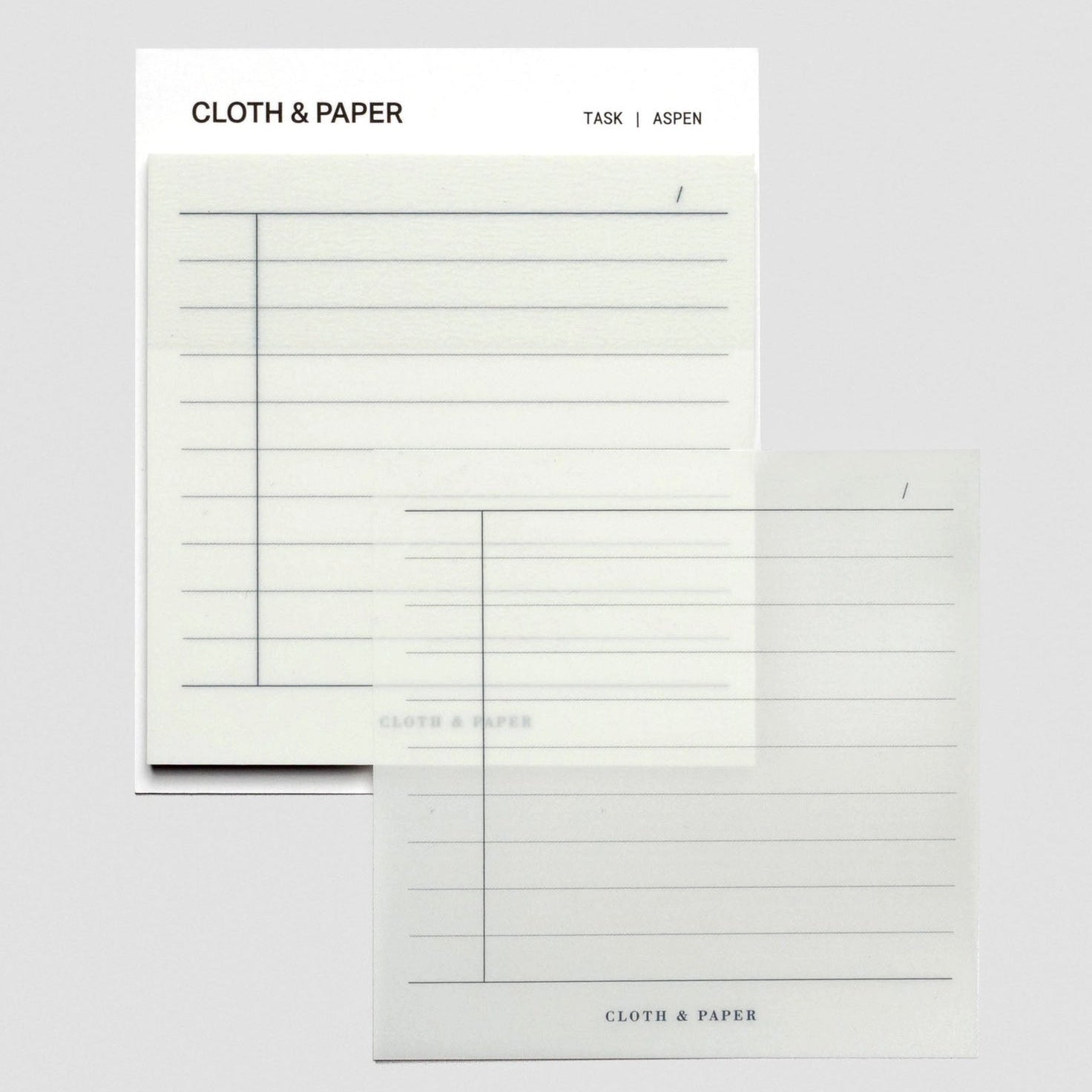 Two sheets of paper with grid lines on a white background, branded 'Cloth & Paper'.