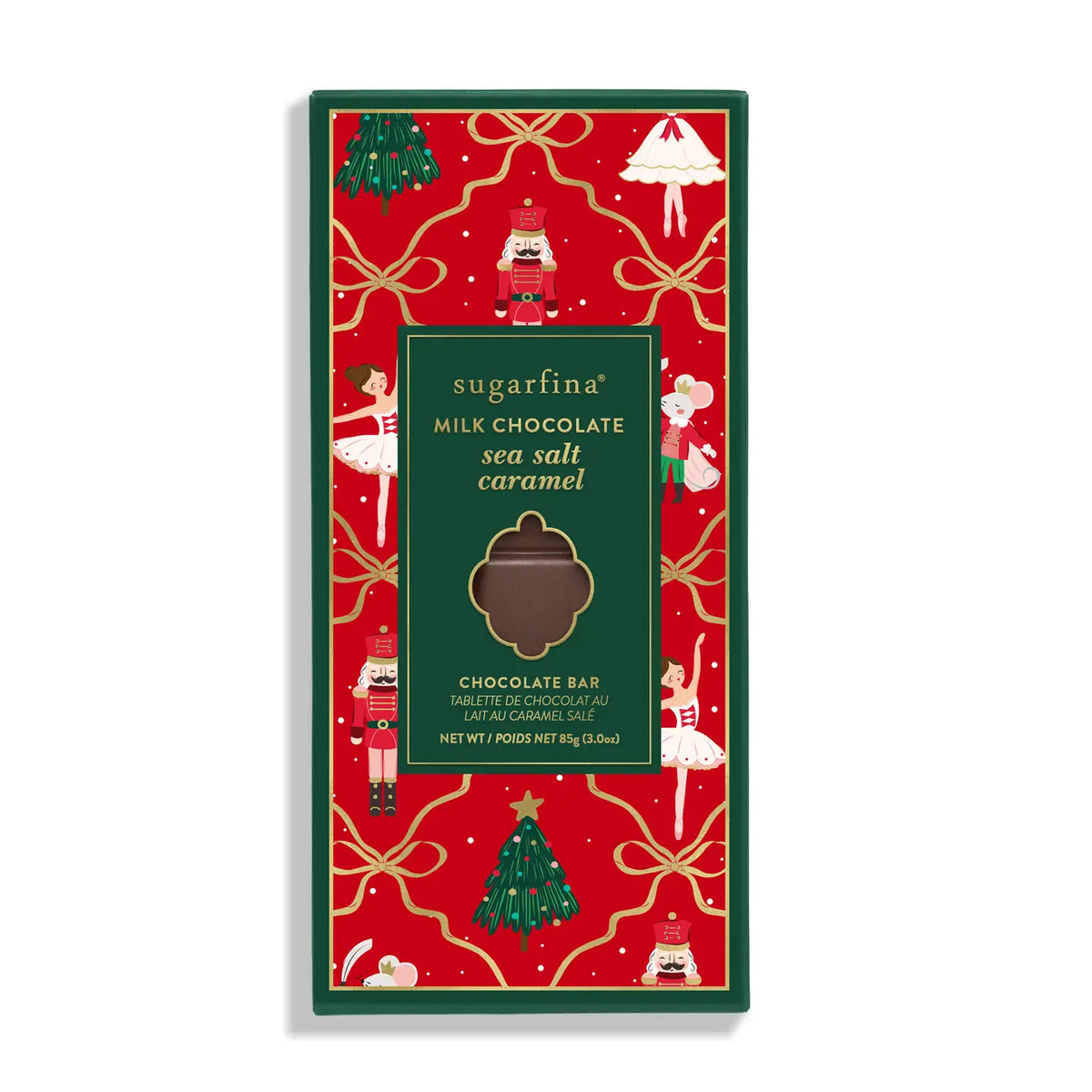 A packaged sugarfina milk chocolate sea salt caramel chocolate bar, featuring a festive Christmas-themed red wrapper with gold ribbons, nutcrackers, and green borders.