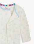 Baby cardigan with colorful trim on a white background