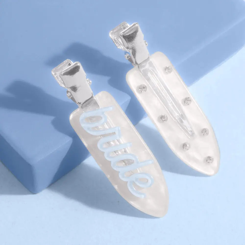 bridal clips on a blue background