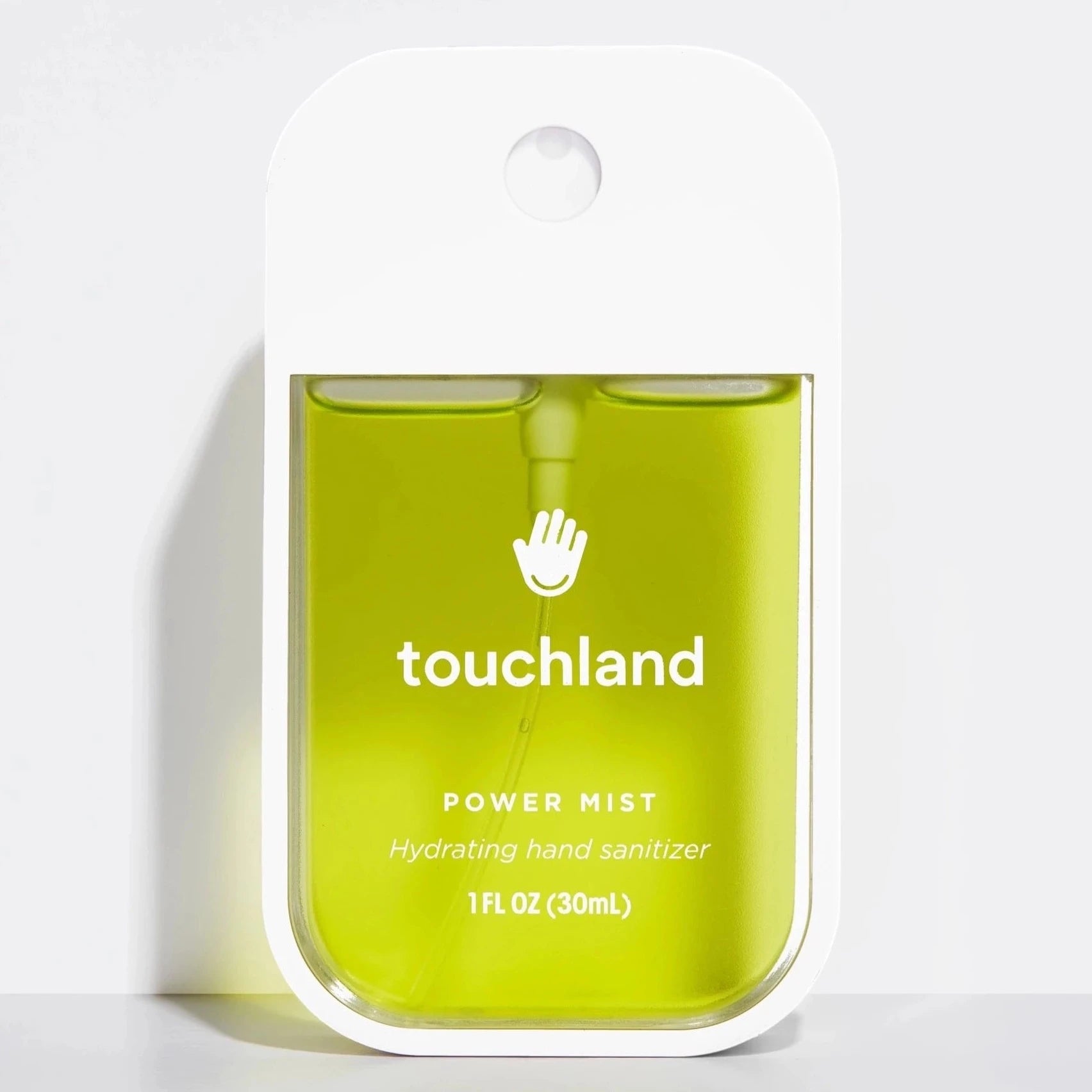 white hand sanitizer with green liquid 