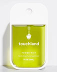 white hand sanitizer with green liquid 