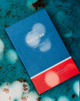 Blue and red book titled 'Route 66 Field Guides' on a textured blue surface