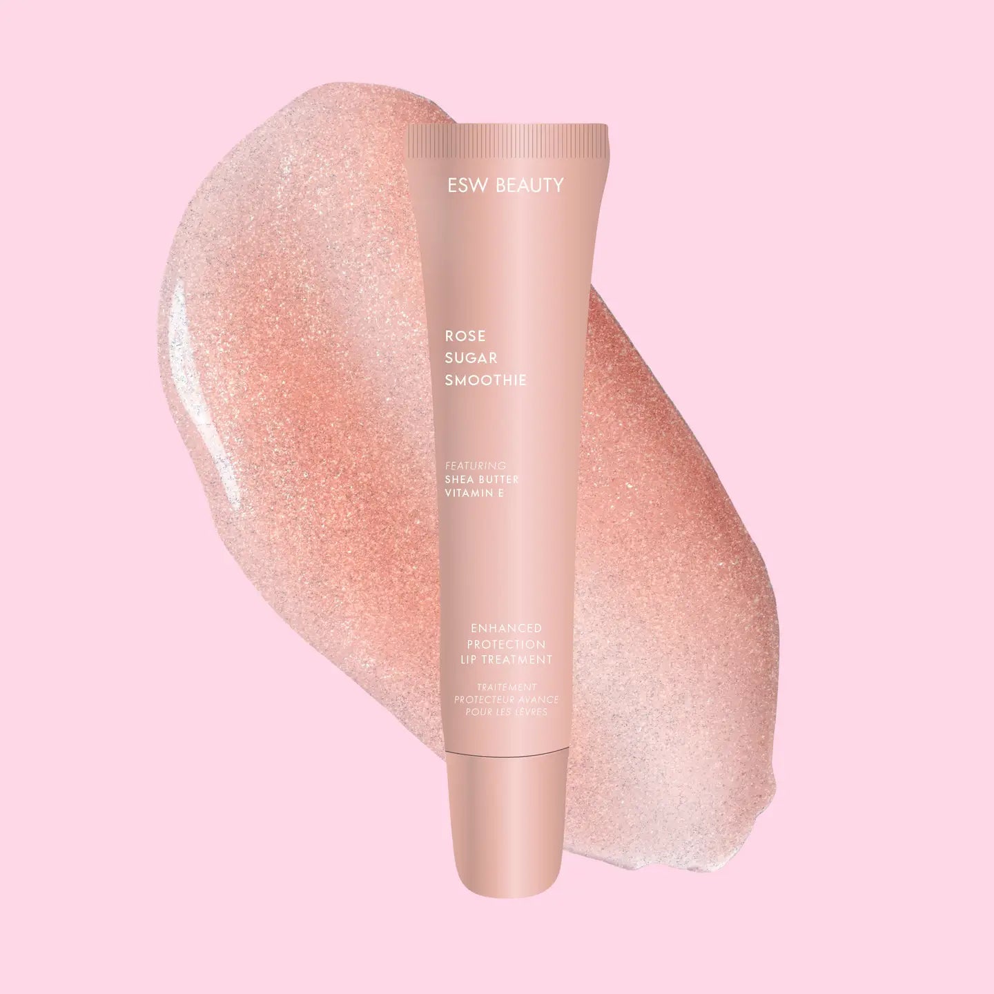 skincare tube labeled "rose sugar smoothie" on a pink-colored background