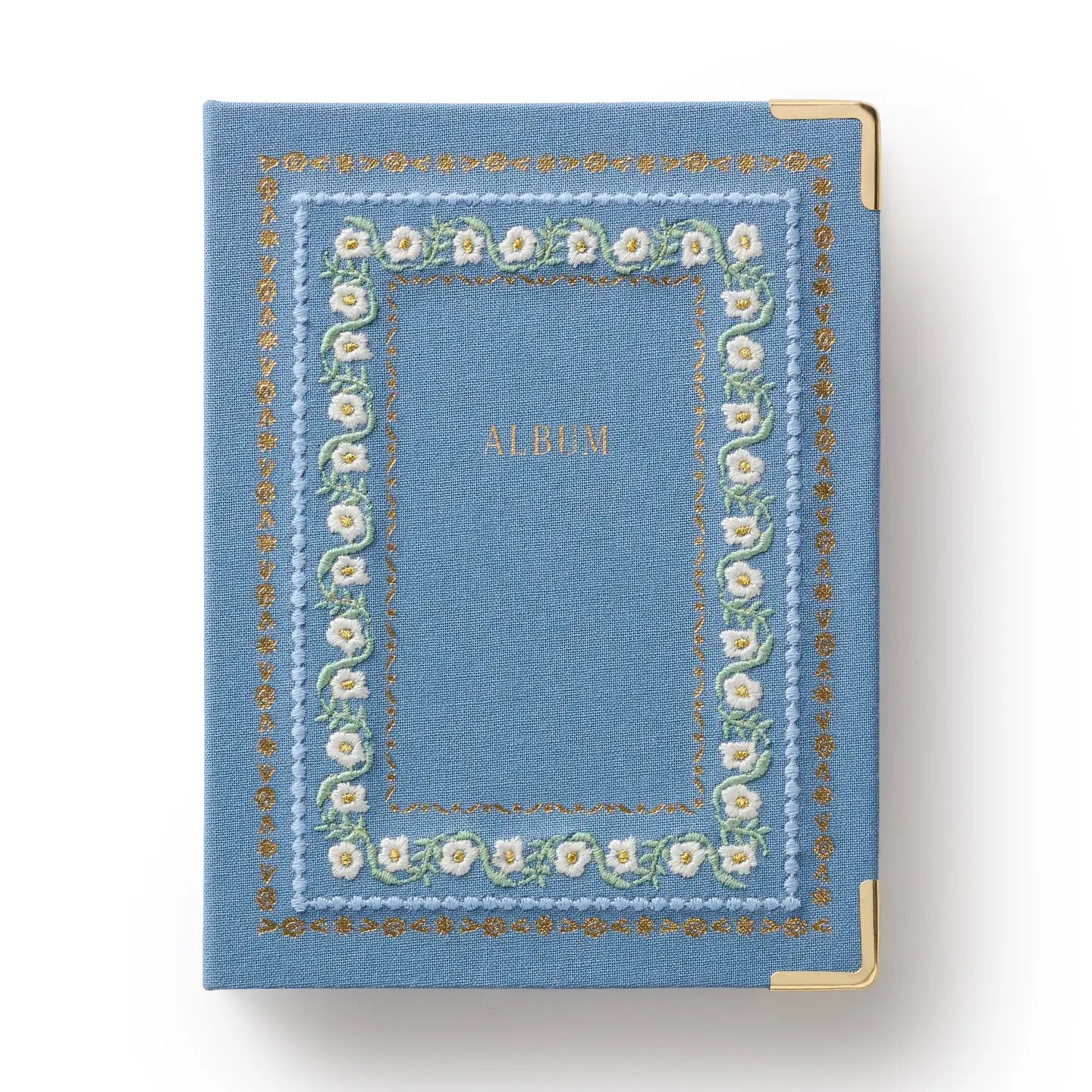 Blue album with floral embroidery on a white background