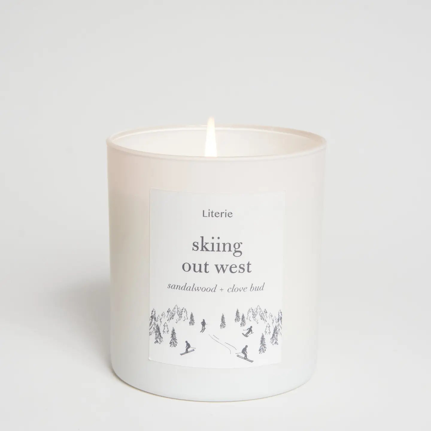 Candle with text and graphics on a white background