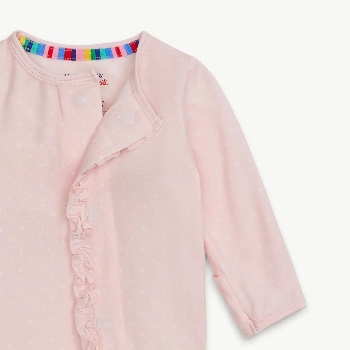Pink baby outfit with colorful trim on a white background