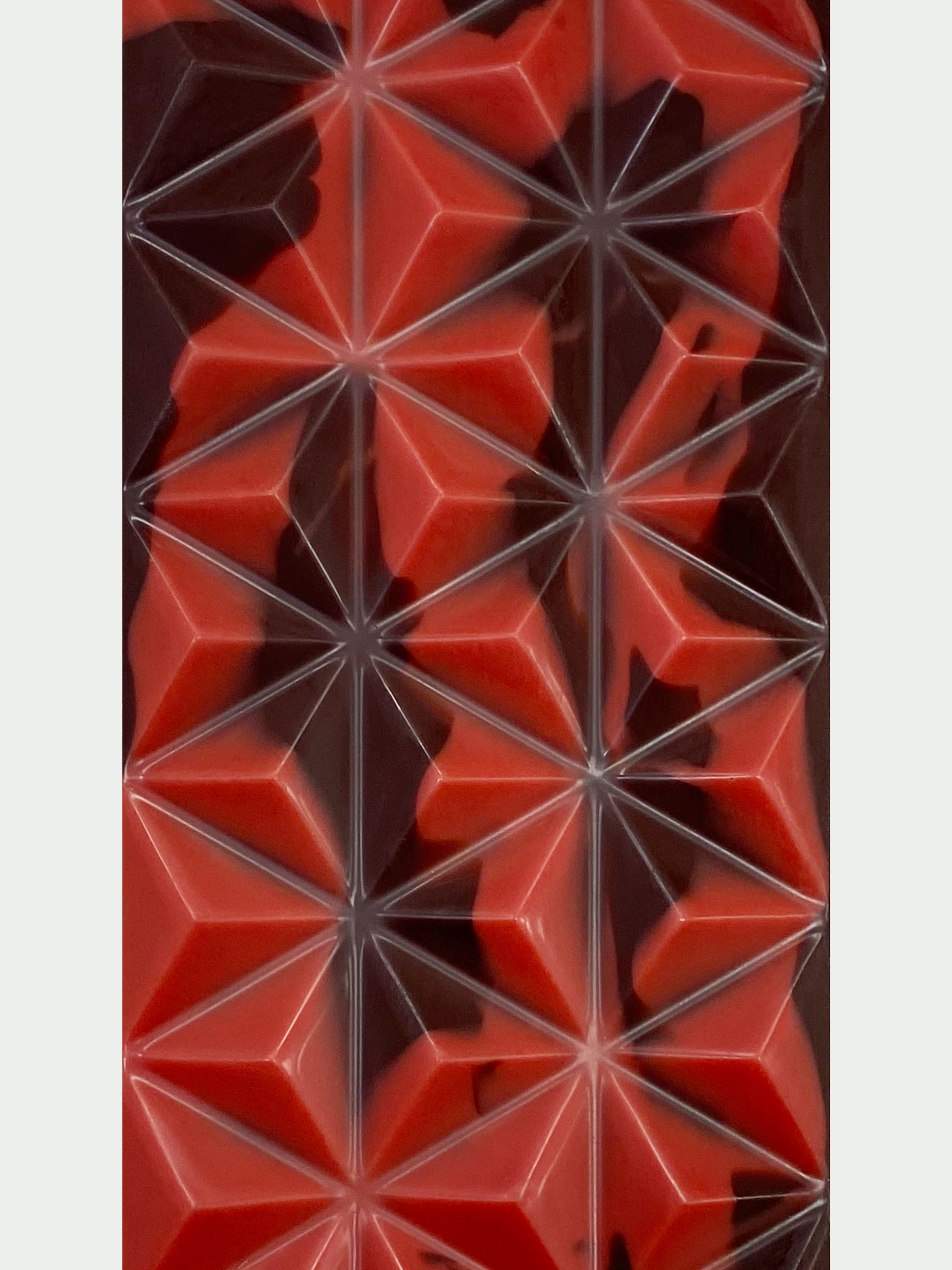 Red and brown geometric embossed chocolate bar