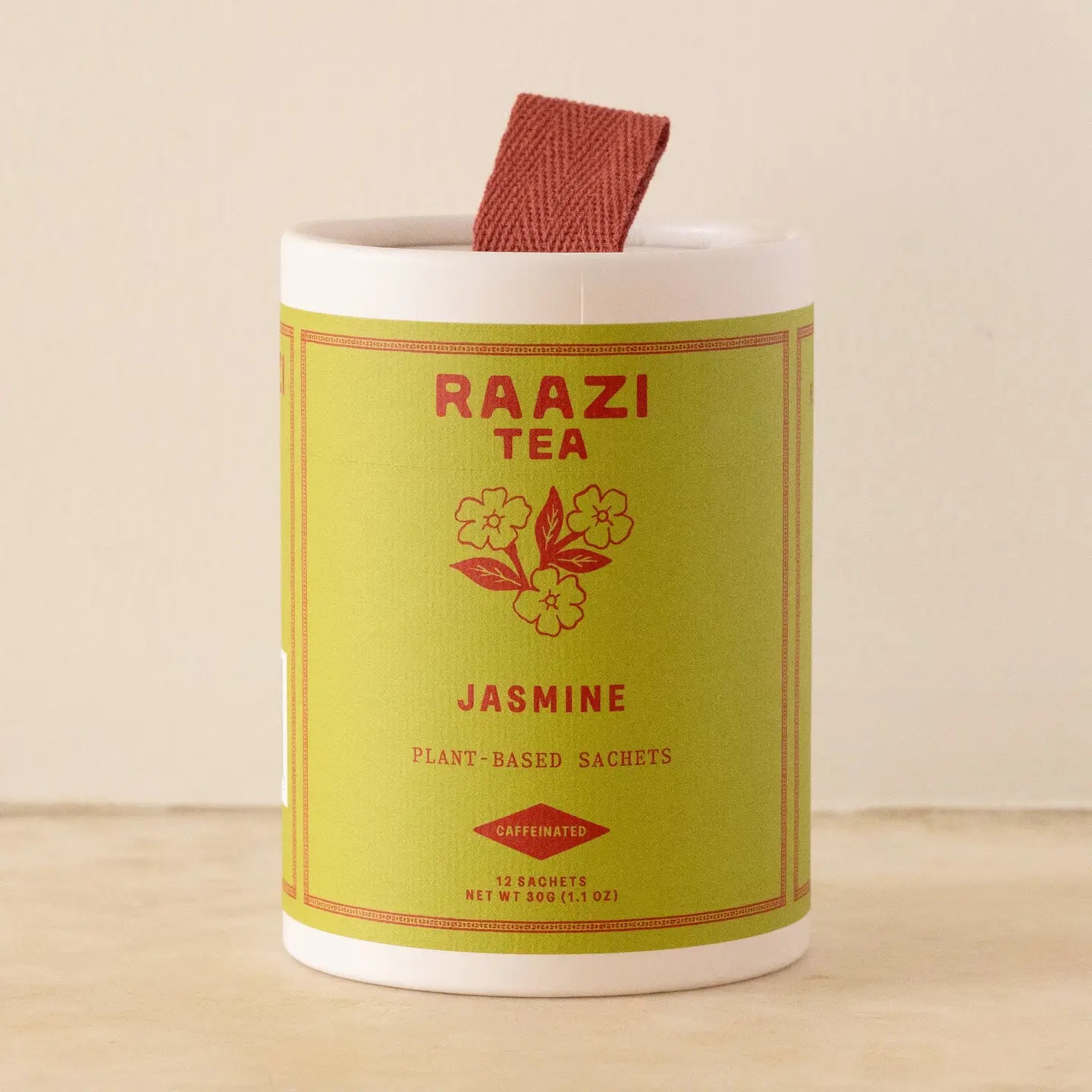 raazi jasmine green tea tube on a white background