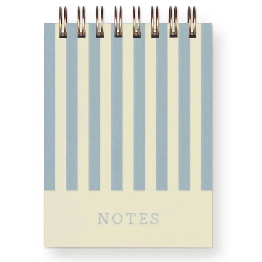 A spiral-bound notepad with vertical stripes in light blue and cream on the cover. The word "NOTES" is printed in a subtle, light blue font at the bottom center of the cover.