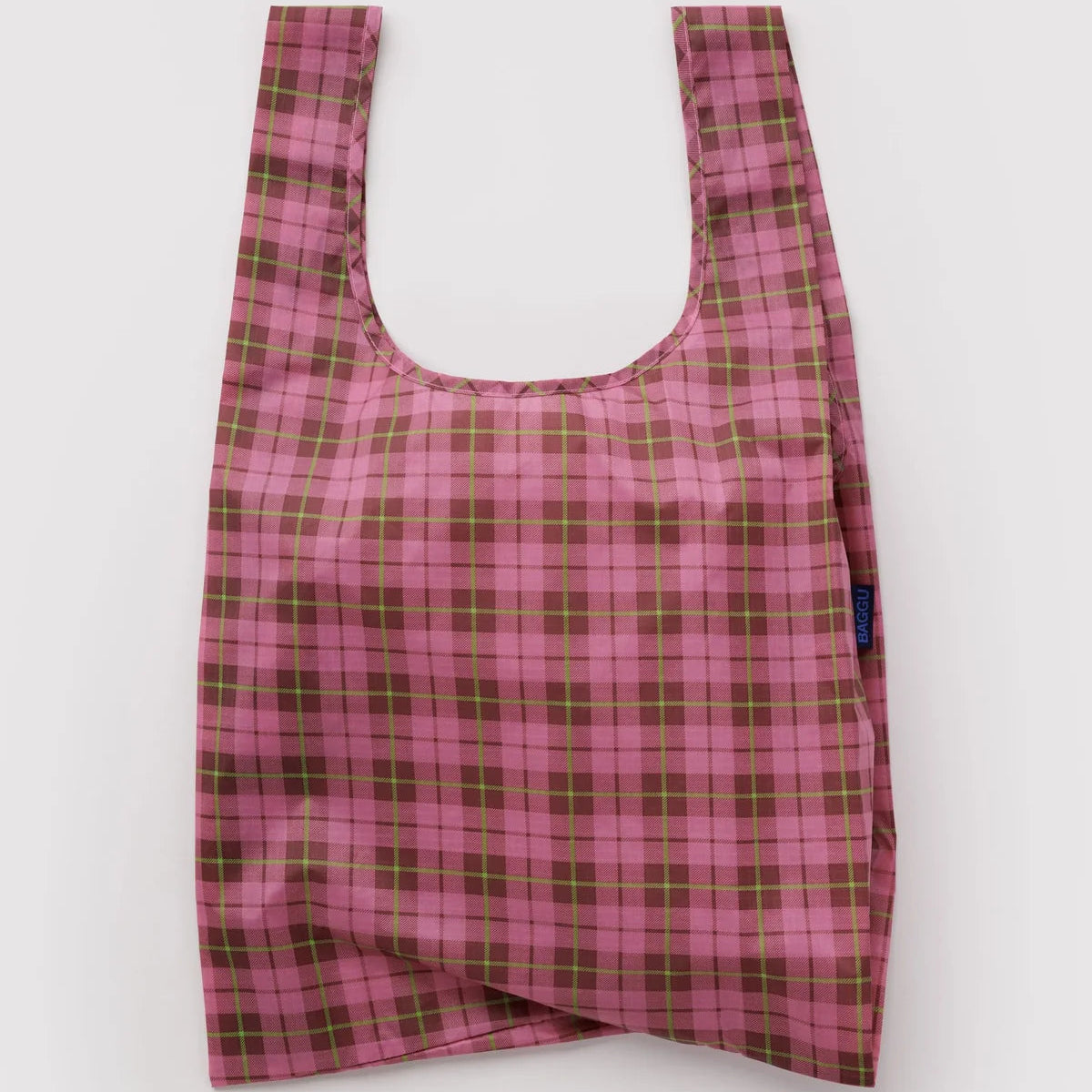 Pink and green plaid reusable bag on a white background