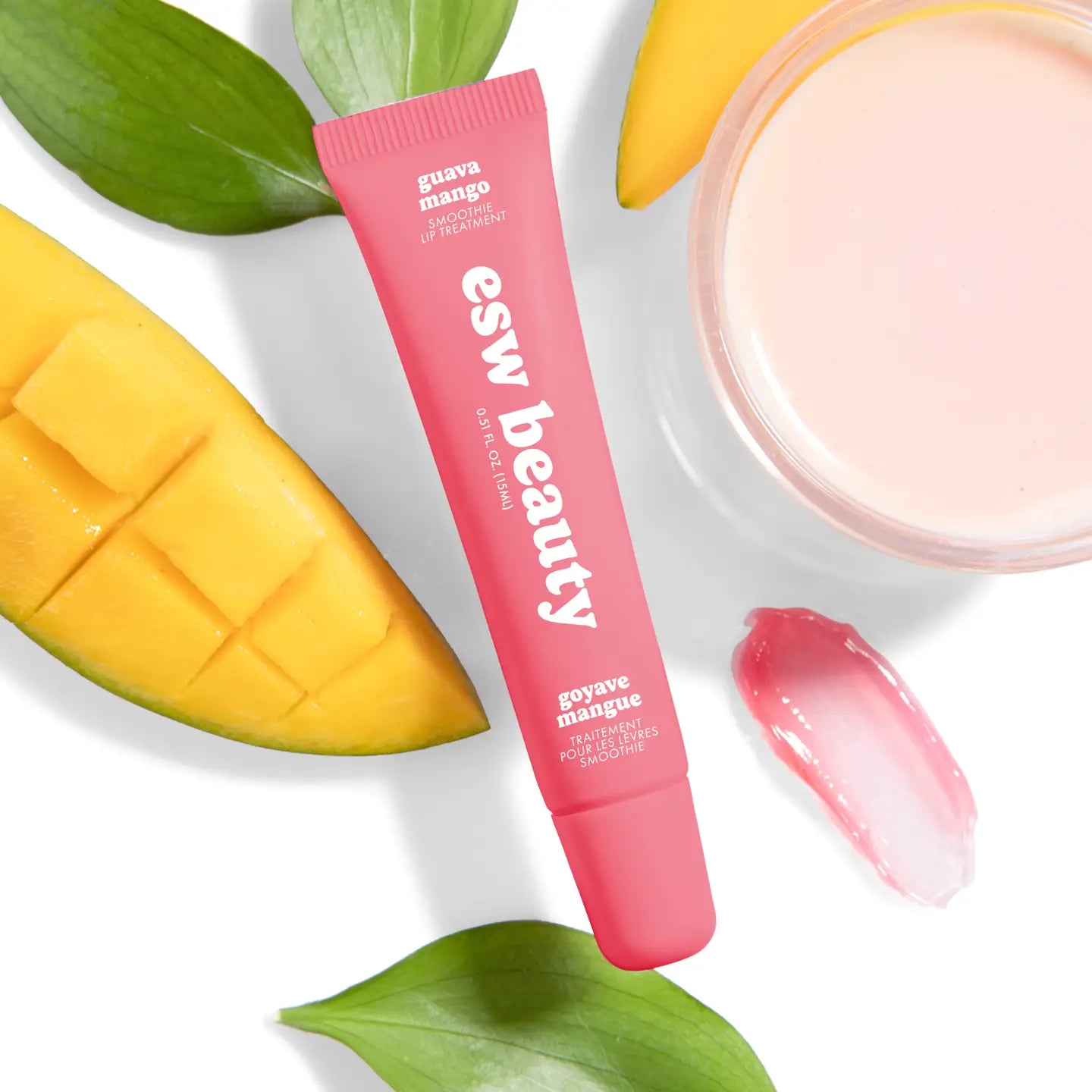 Pink skincare product with 'esw beauty' branding on a white background with mango and leaves.