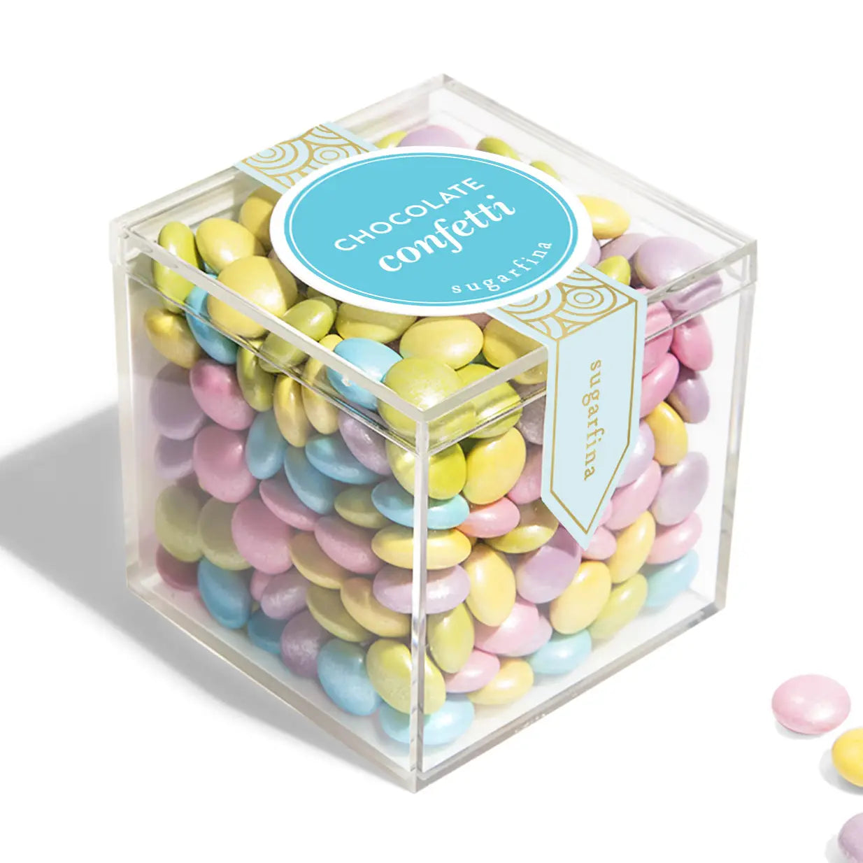 Cube of colorful chocolate confetti with a visible brand label on a white background