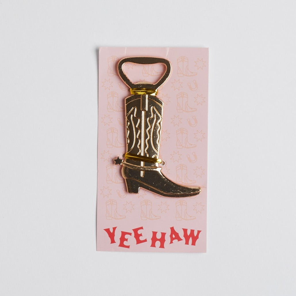 Cowboy Boot Bottle Opener on pink &quot;Yeehaw&quot; card, resting on white background.