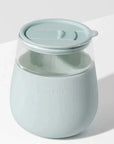 mint sleeve with clear glass stemless wine glass