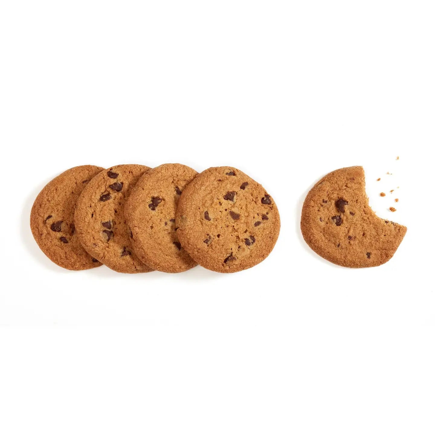 Chocolate chip cookies with one bitten cookie on a white background