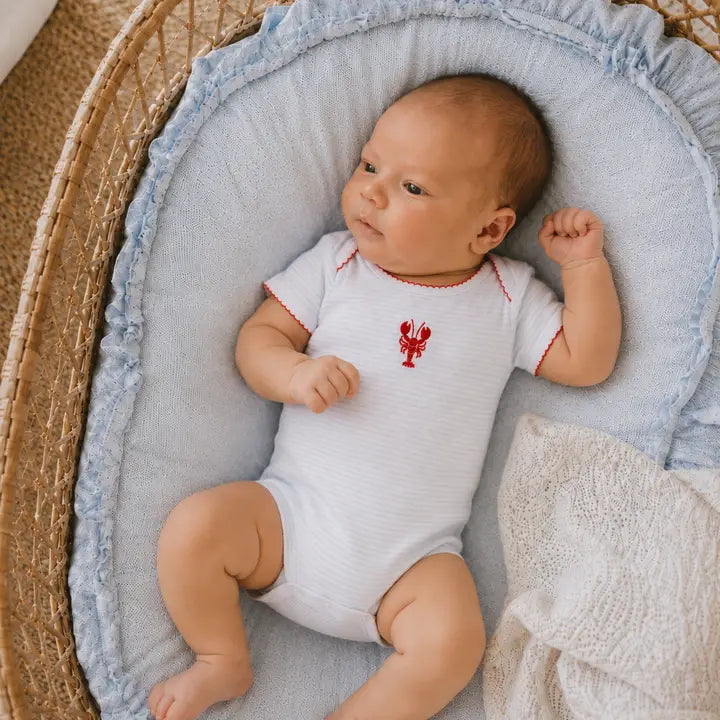 blue baby bodysuit with a red lobster on a baby