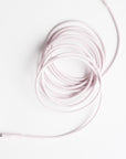 Coil of pink phone charging cable
