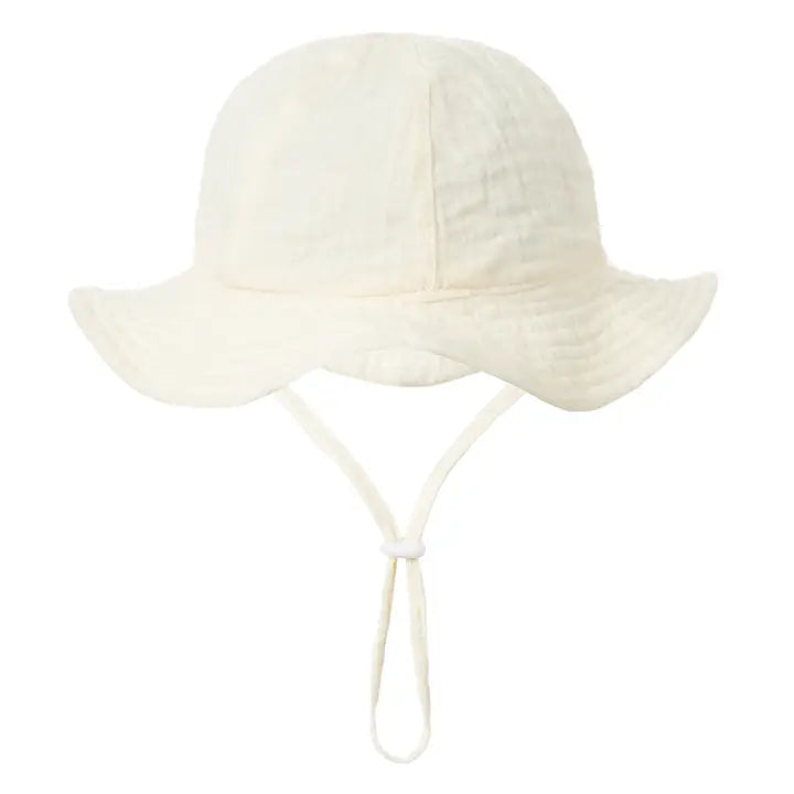 beige bucket hat on a white background