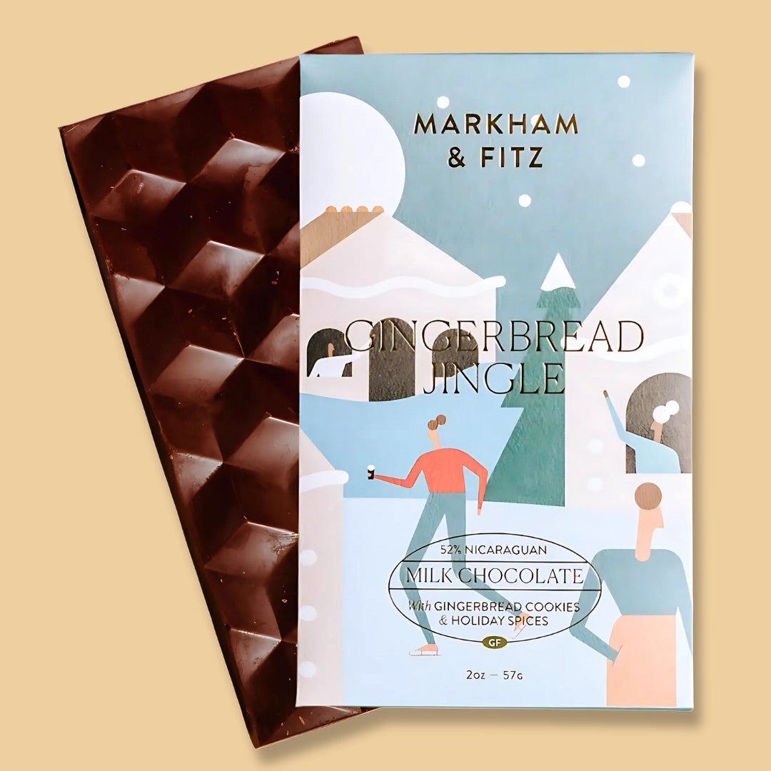 Gingerbread Jingle chocolate bar with Markham & Fitz packaging on a beige background