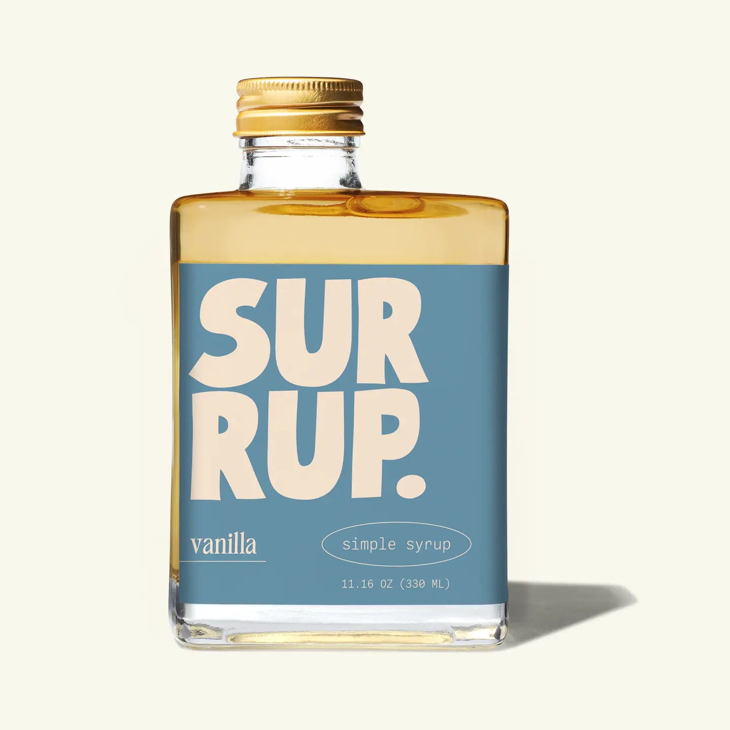 Bottle of vanilla simple syrup with a blue label on a white background