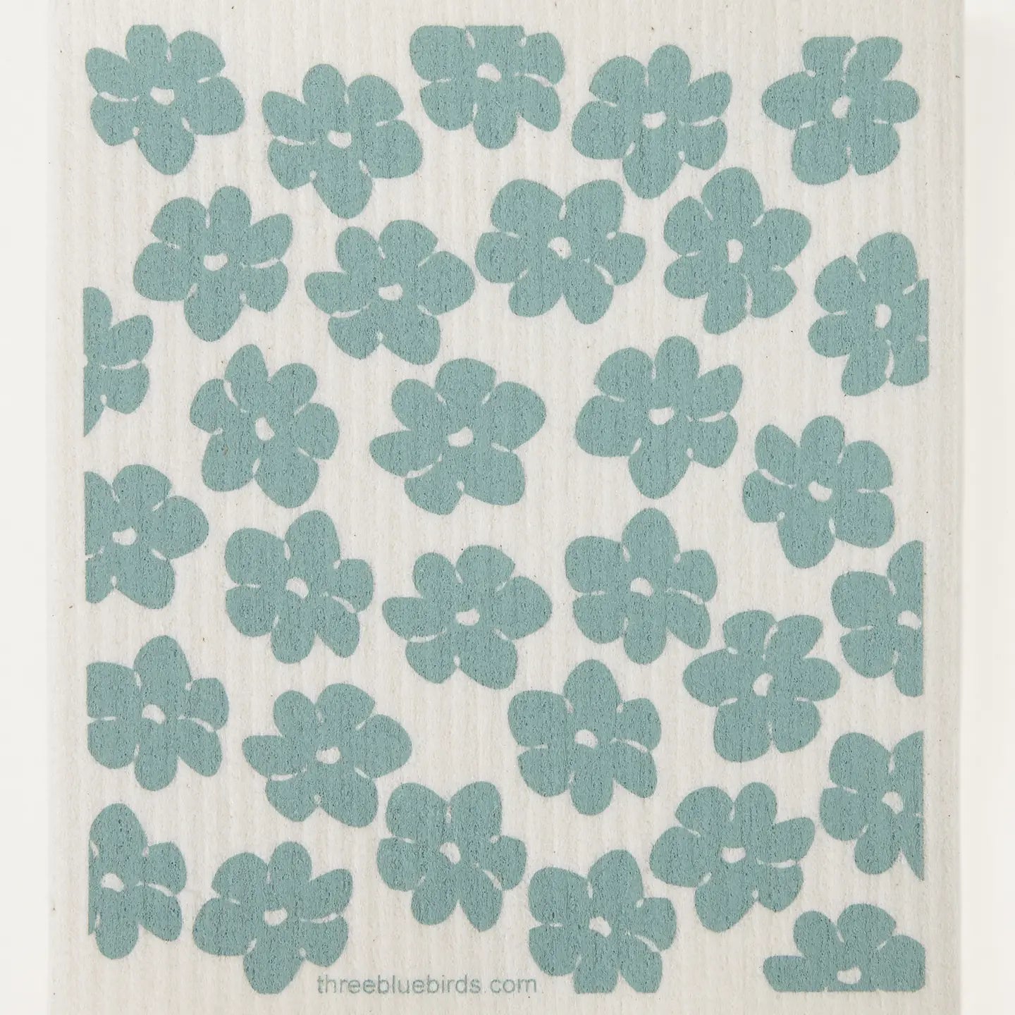 Patterned fabric with blue flowers on a white background