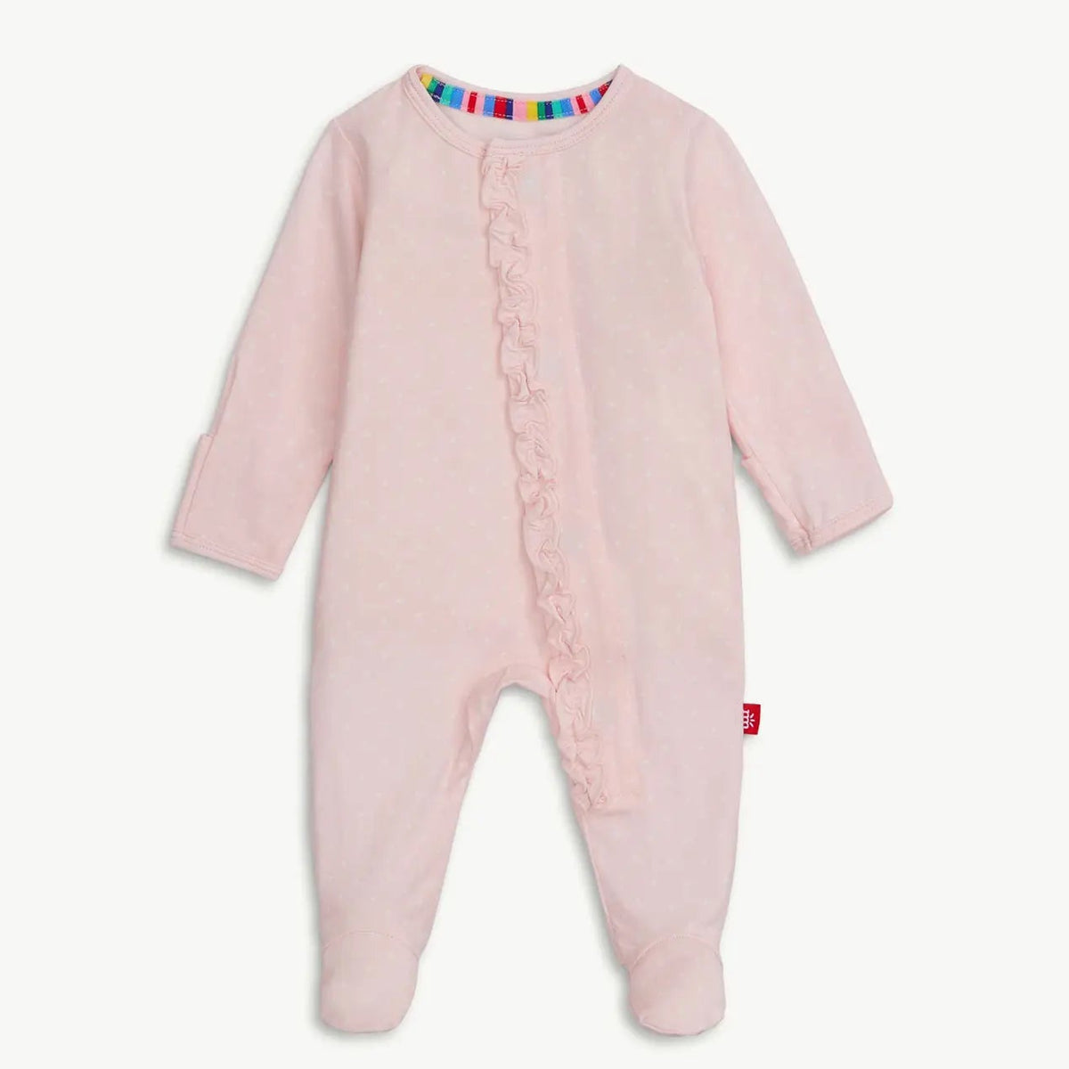 A baby's long-sleeve footed sleeper in light pink, featuring a ruffled trim down the front and a colorful striped inner collar, shown against a plain light background.