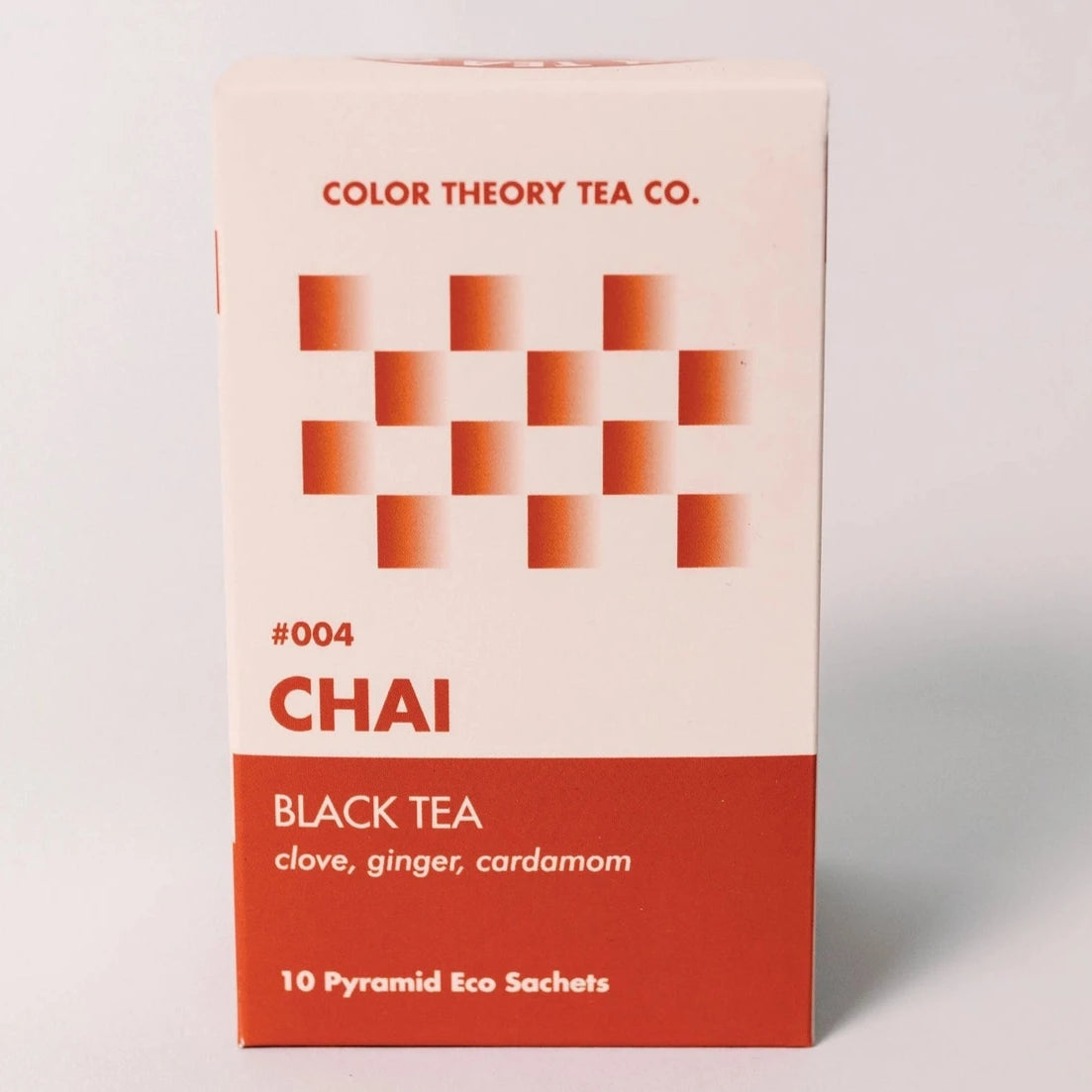 red tea box with design on it