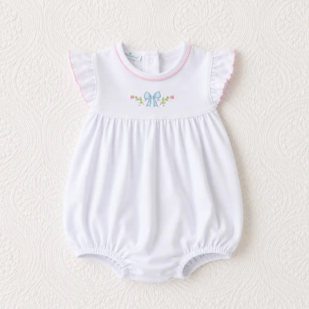 evelyn's romper on a white background