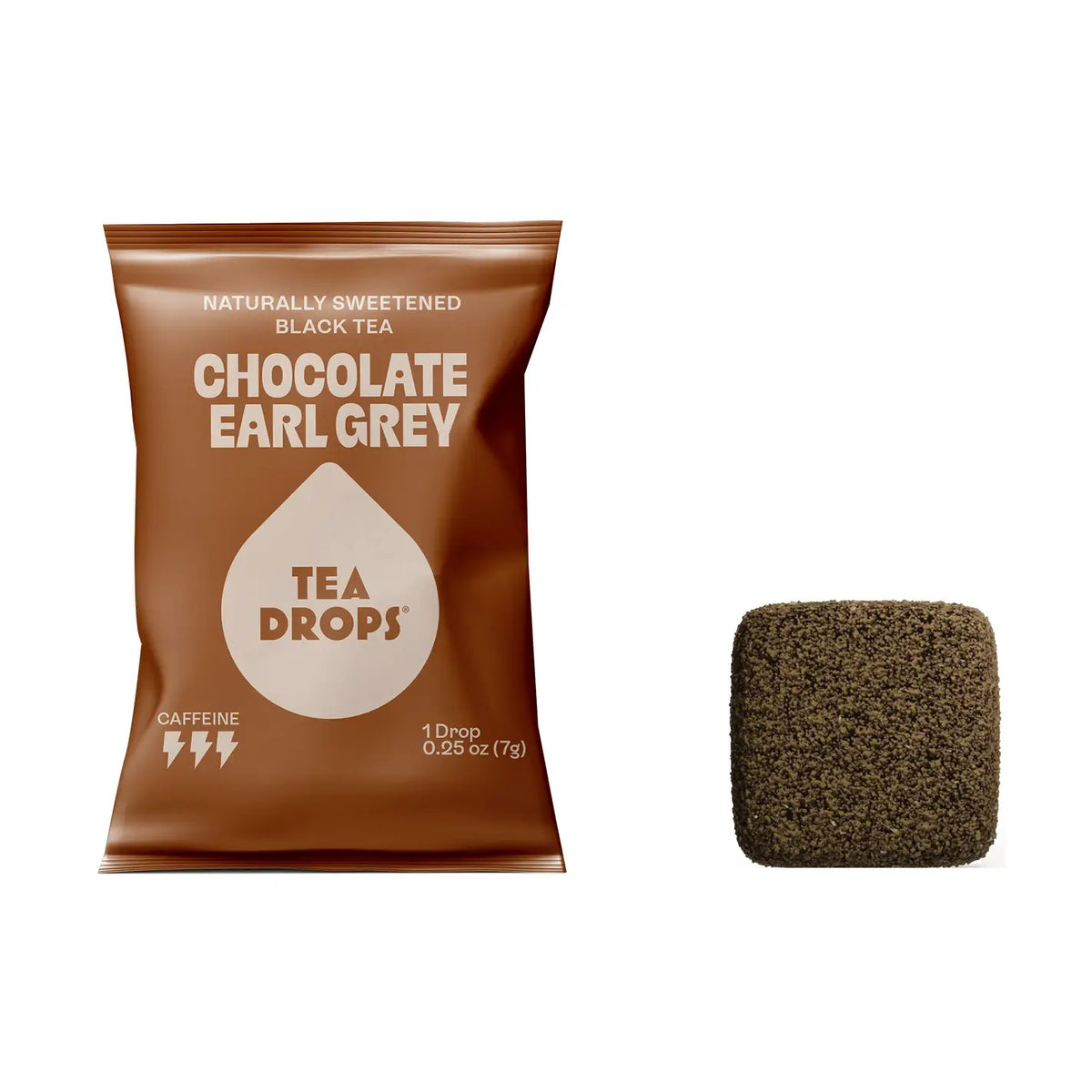 A package of Tea Drops Chocolate Earl Grey black tea drops next to a single square dark brown tea drop on a white background.