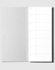 Open notebook with lined pages on a white background