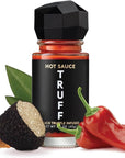 Hot sauce bottle labeled 'Truff' with truffle and chili pepper on a white background