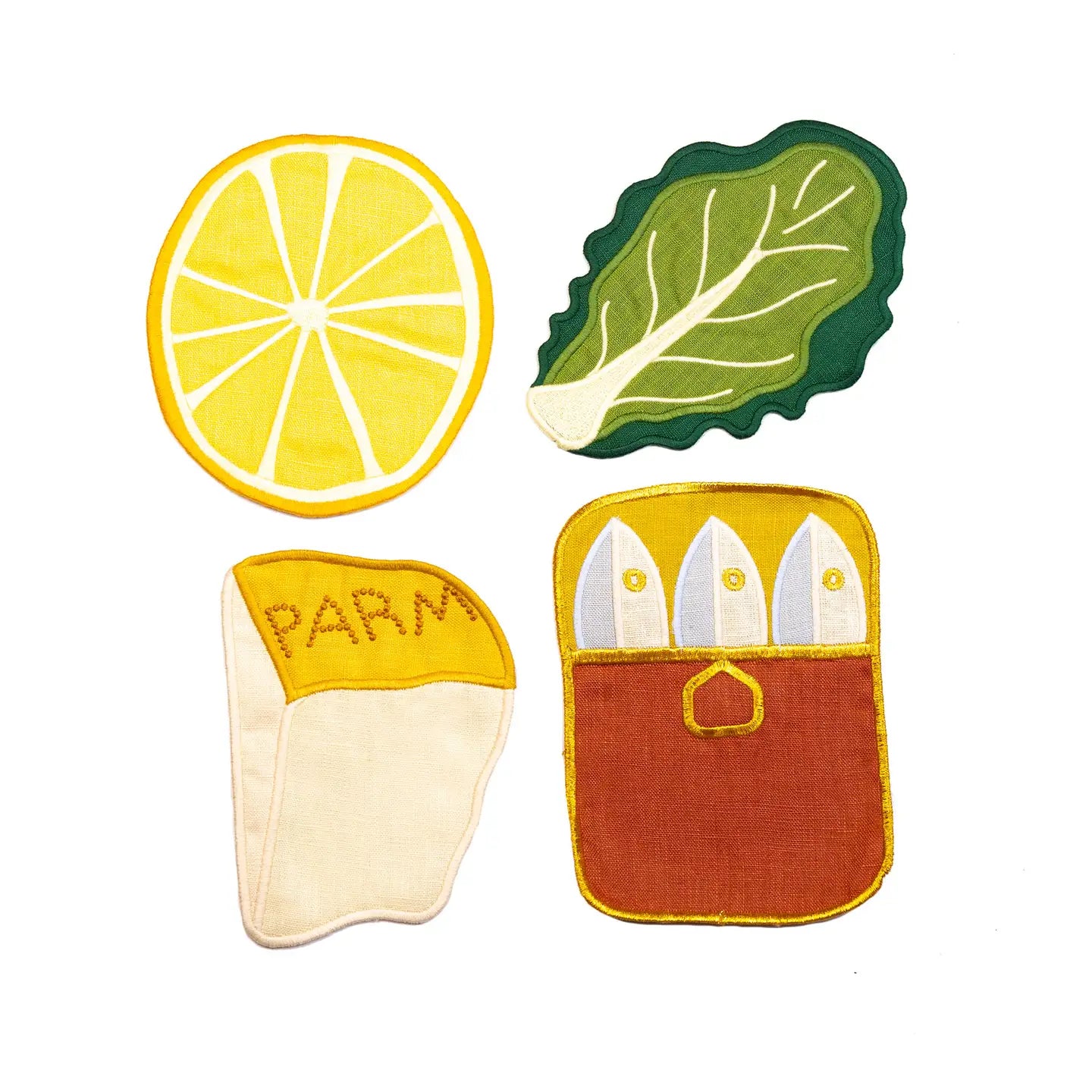 Set of colorful kitchen pot holders shaped like a lemon, leaf, Parmesan cheese, and baguette on a white background.