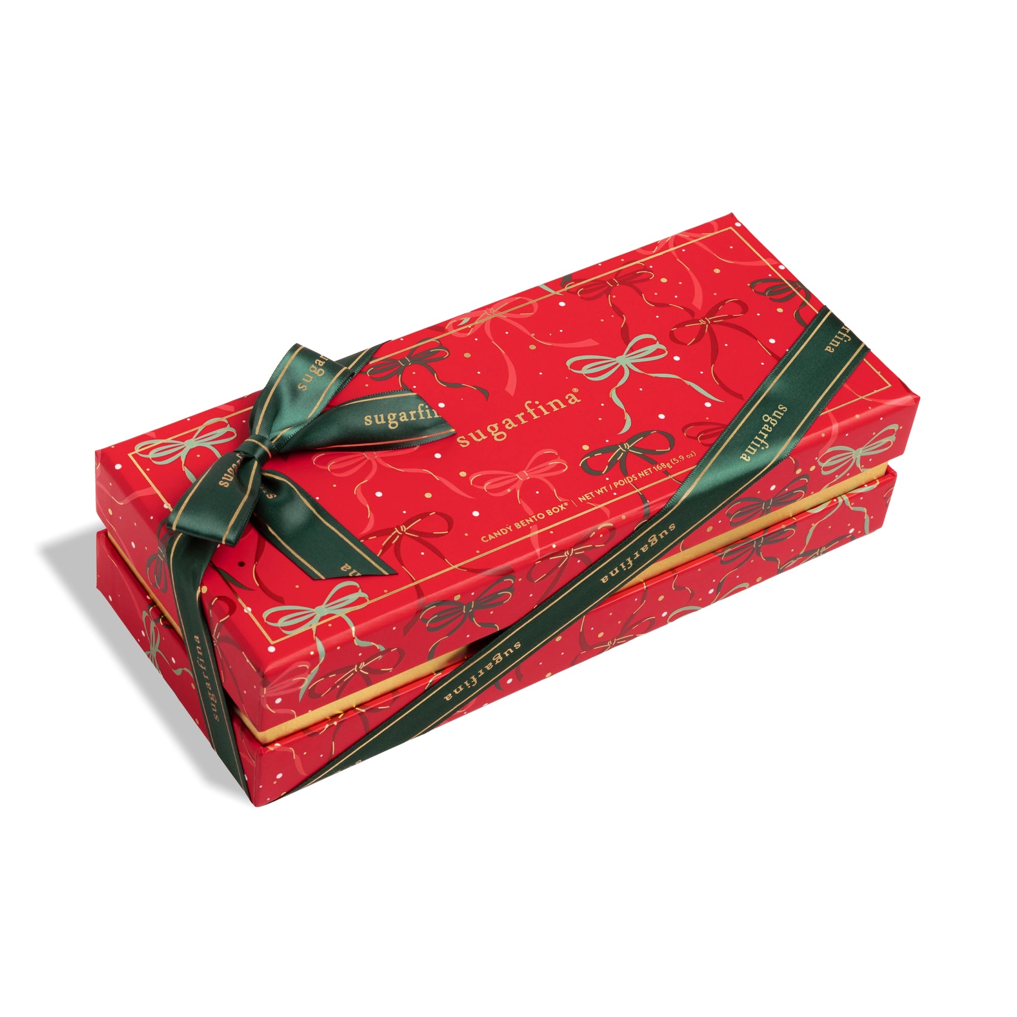 Red sugarpoin box with green ribbon on a white background