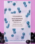blueberry sheet mask with blueberries around it