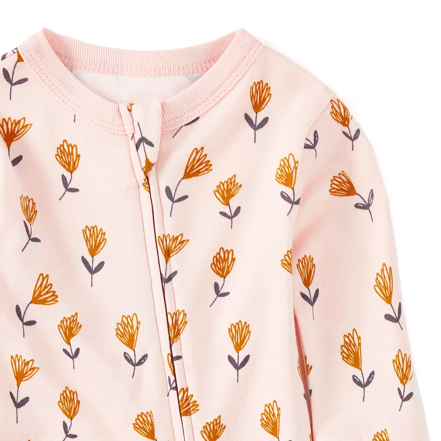 Baby onesie with floral pattern on a white background