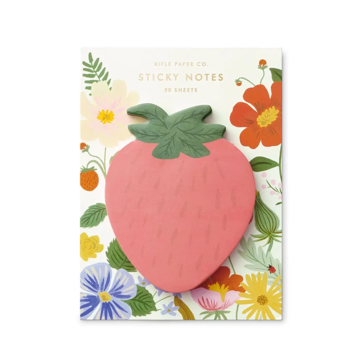 red strawberry shaped notepad on white floral background 