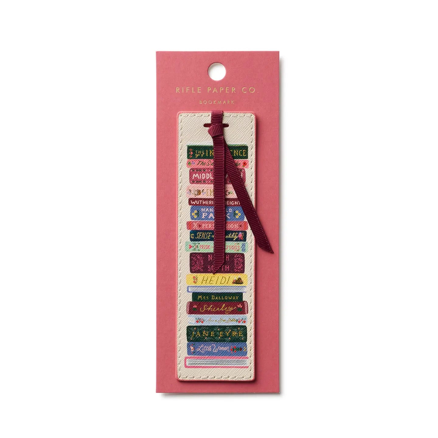 Decorative bookmark with colorful text on a pink Rifle Paper Co. packaging