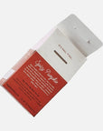 red tea carton with 'spicy pumpkin' written on it in white