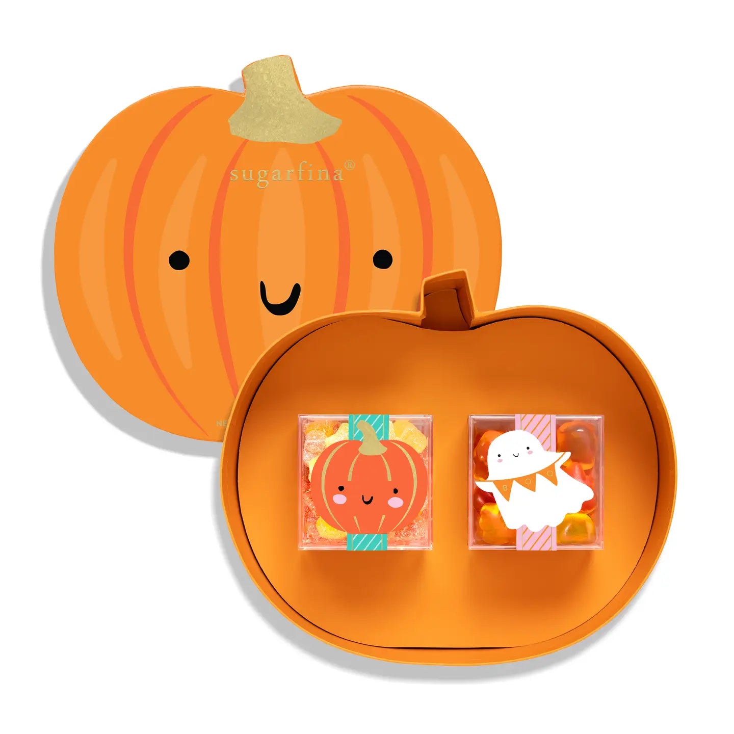 A pumpkin-shaped orange gift box set from sugarfina, featuring a large pumpkin lid with a smiling face and a smaller pumpkin-shaped base holding two small decorative candy or accessory boxes with cartoon pumpkin and ghost designs.