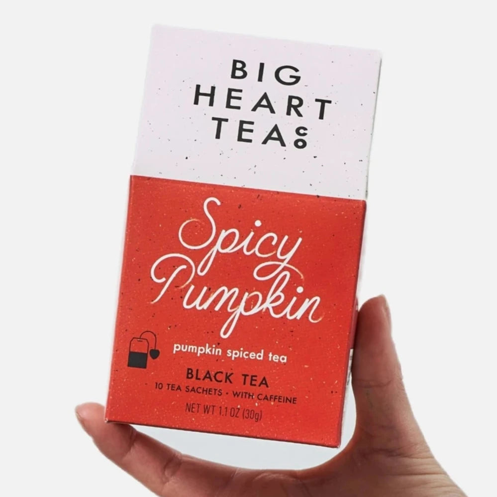 red tea carton with 'spicy pumpkin' written on it in white