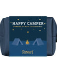 Camping kit packaging with 'Happy Camper' text and Pinch Provisions logo on a blue background